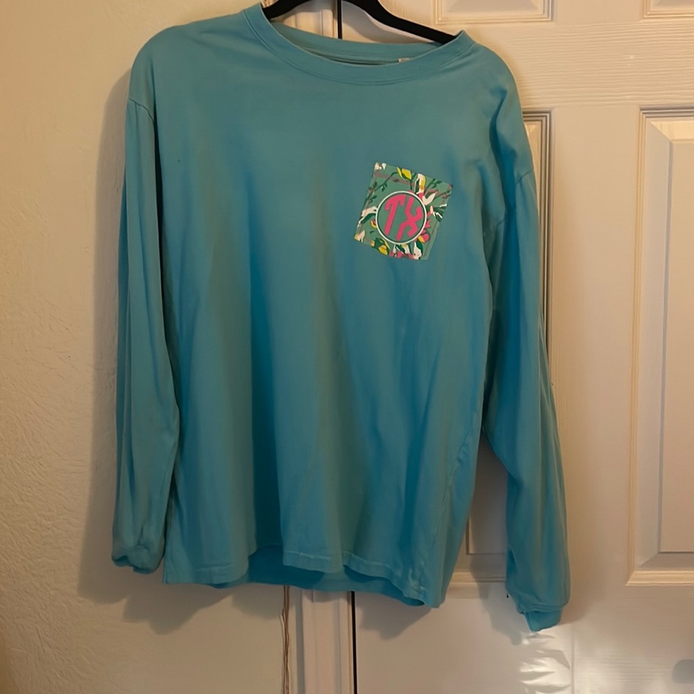 Light blue Tx long sleeve with floral. Size M